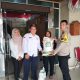 Anggota Polsek Balaraja Pantau Bantuan Pangan Beras Bulog Juni & Juli 2025 di Aula Desa Cangkudu