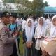 Humas Polres Tanjungbalai Rayakan HUT ke-74 di SMK 5