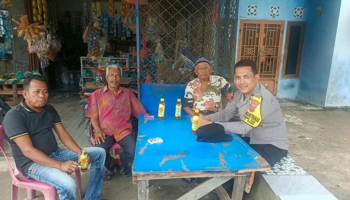 Bhabinkamtibmas Polsek Sei Tualang Raso Edukasi Warga Sumber Sari Soal Bahaya Narkoba