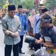 Menag Nasaruddin Umar Coba Atraksi Debus Banten di Tengah Semarak Pawai Taaruf MTQ XXXI Nasional